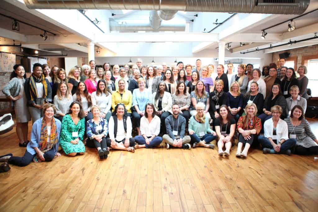A group of JSI staff pose for a photo.