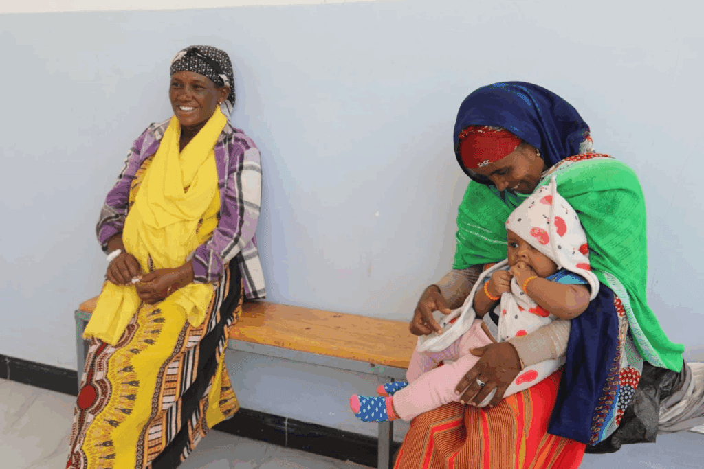 A mother attending antenatal care services at Bika Comprehensive Health Post.