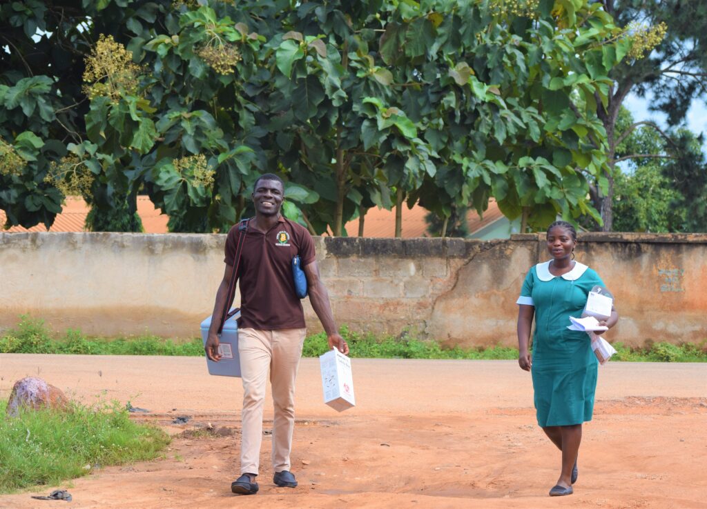 Health care workers in Ghana embarking on a house to house campaign to vaccinate eligible people against COVID-19 at the height of the pandemic.