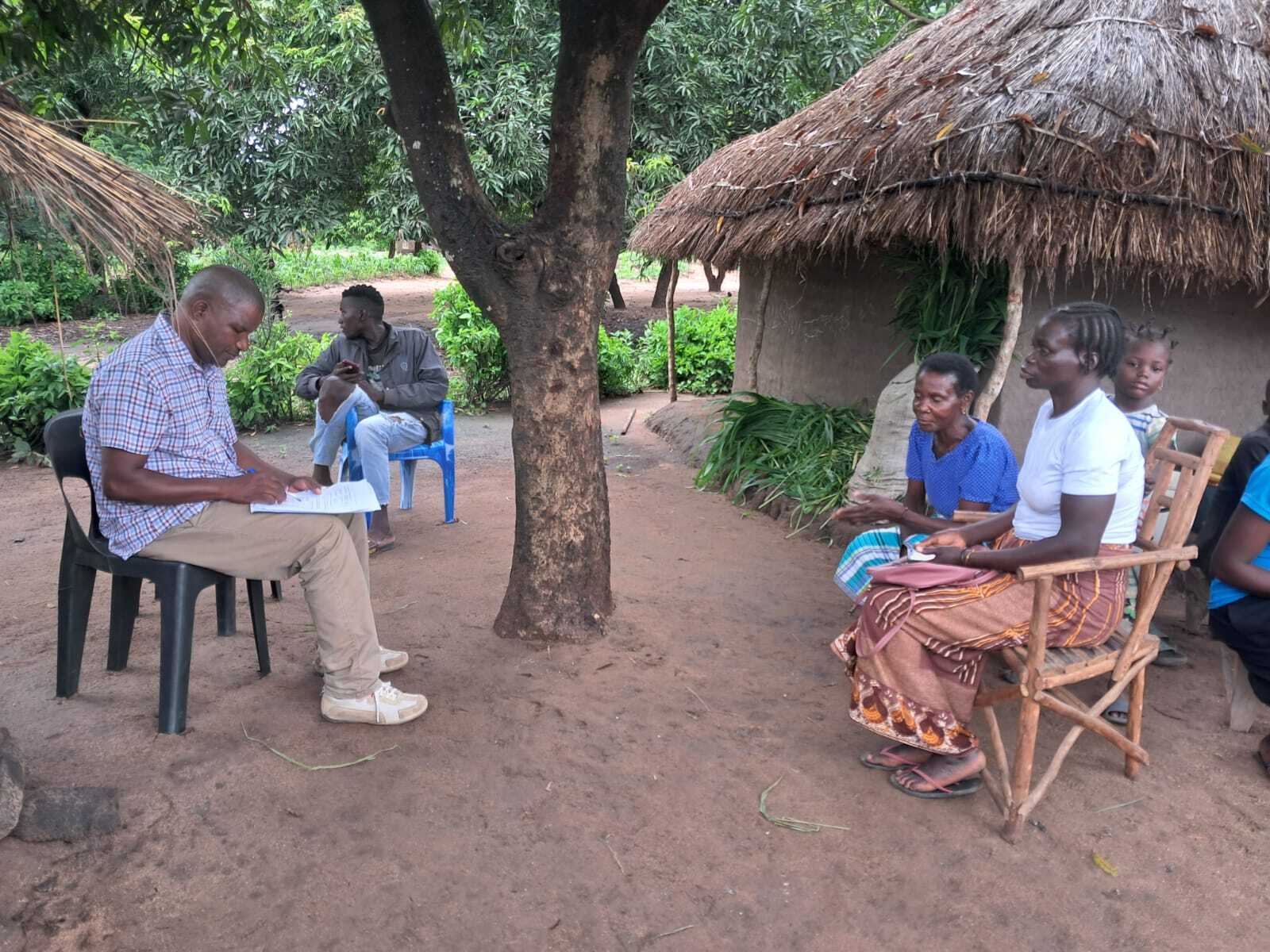 Alberto Domingos interviews community leaders in Sofala province during the pilot of the Community Leader Mapping Tool.