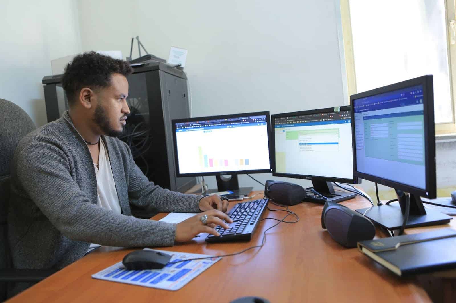 A HMIS worker reviews data on the DHIS 2 at Zewditu General Hospital.