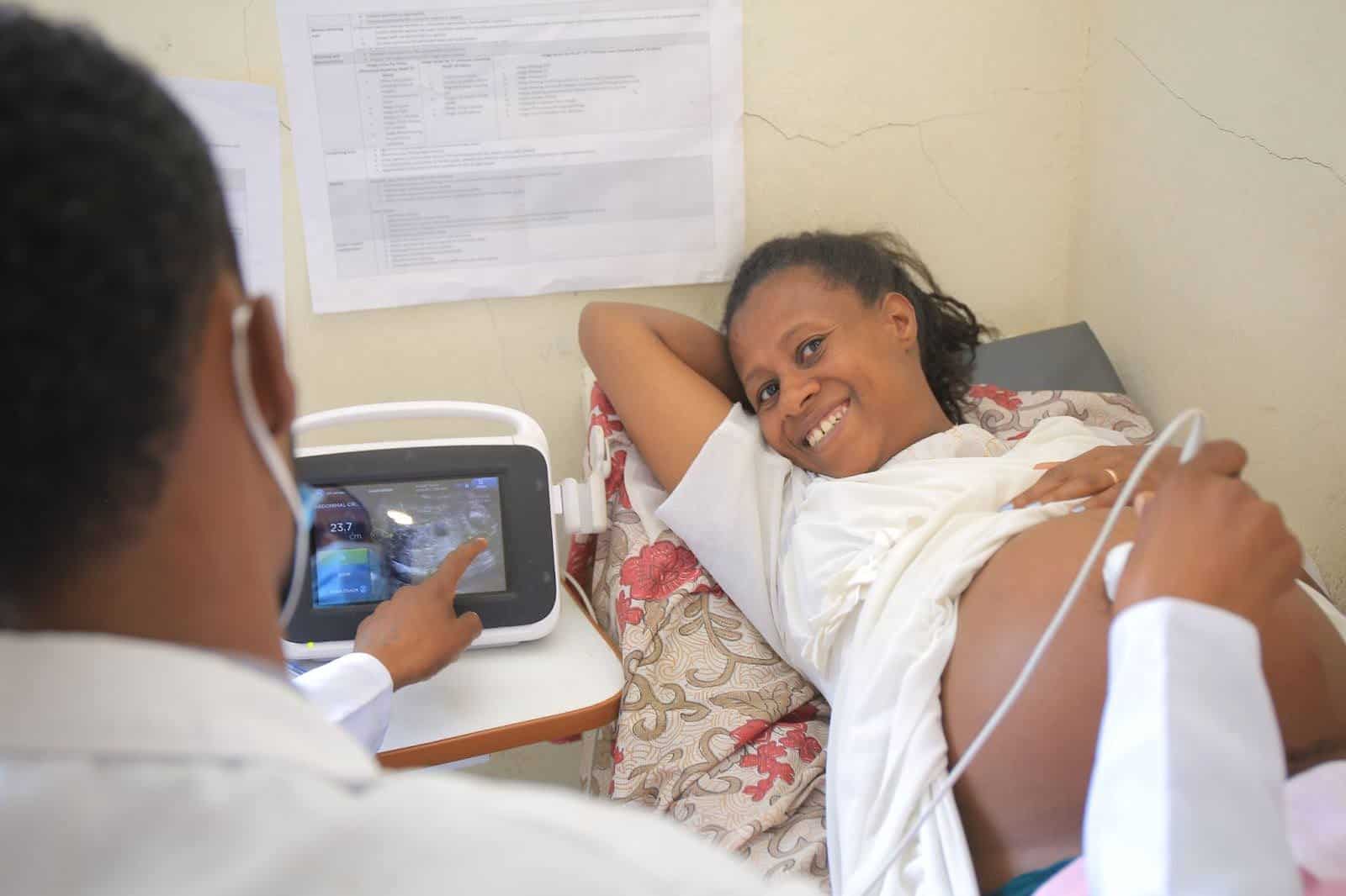 A mother in Ethiopia gets an ultrasound for the first time.